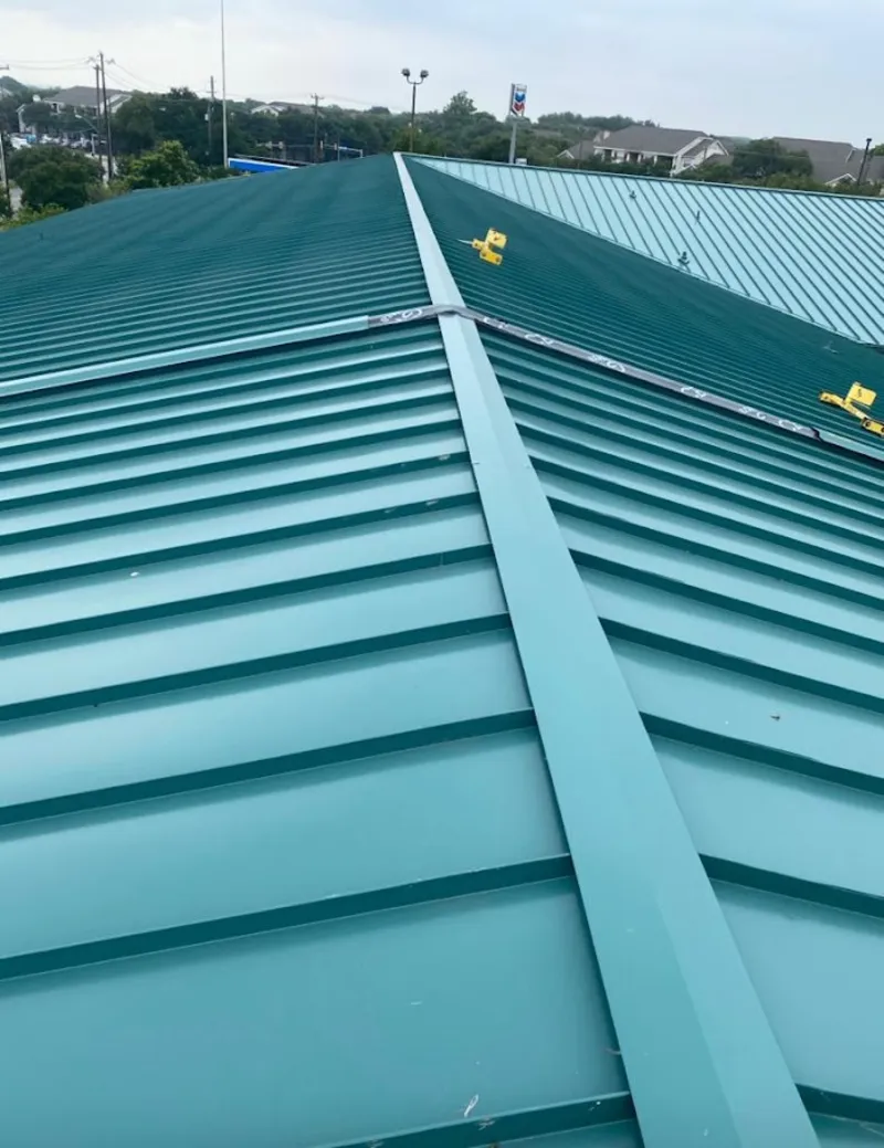 Green commercial metal roof ridge and valley for Metal Roof Repair in Roseville